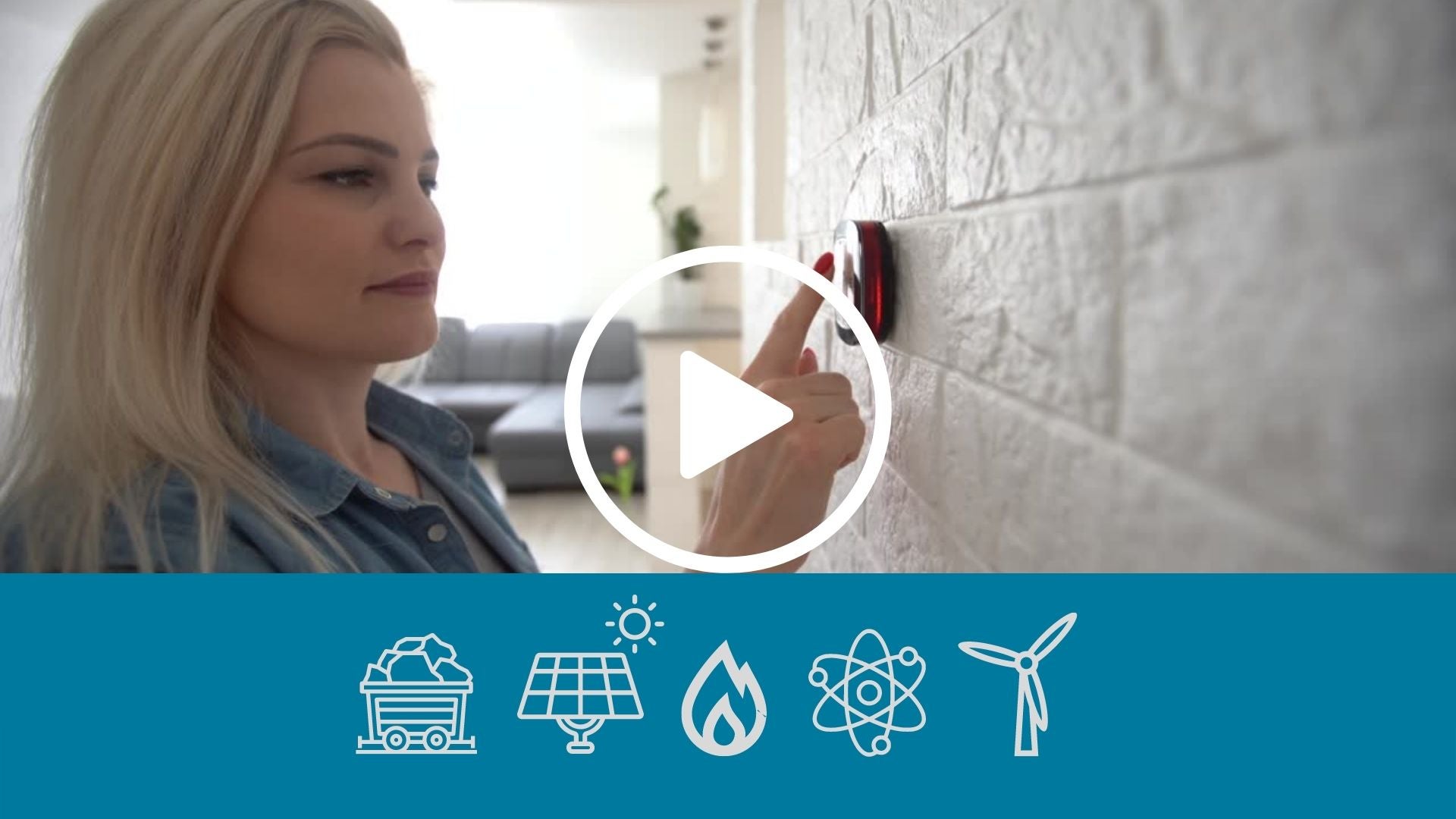 woman adjusting thermostat