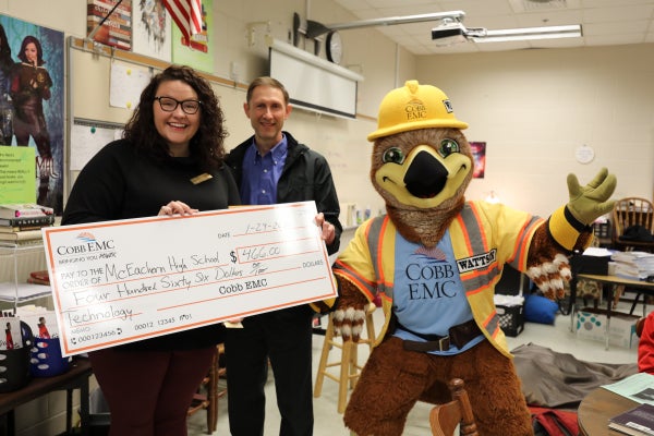 teacher accepts mini grant from Cobb EMC