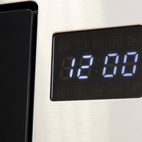 Digital clock on microwave